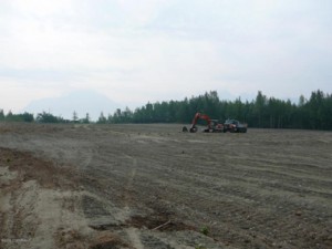 Fireweed Road in Alaska for commercial sale, excavator on property