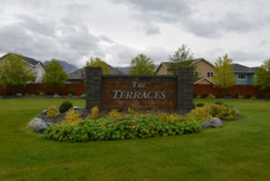 Terraces sign on grass, commercial real estate in Alaska